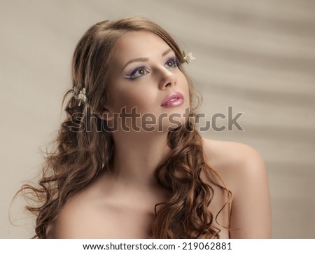 Beautiful Girl with Flower. Pastel Colors. background with soft shadows