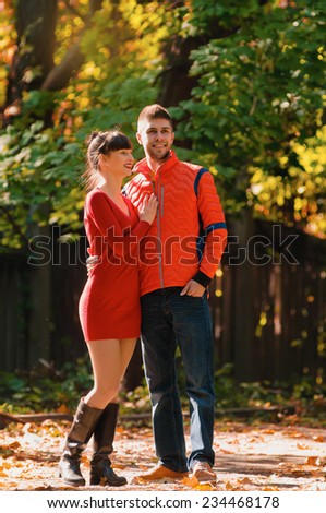 happy autumn couple in love portrait. outdoor. full length