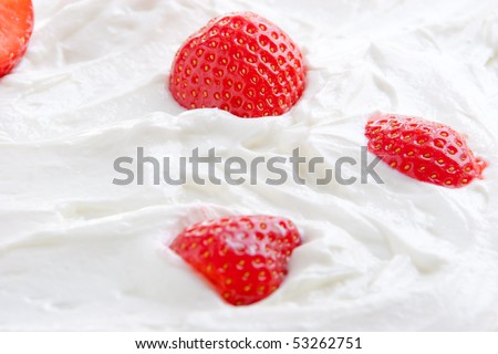 Fresh ripe strawberry halves in tasty curd