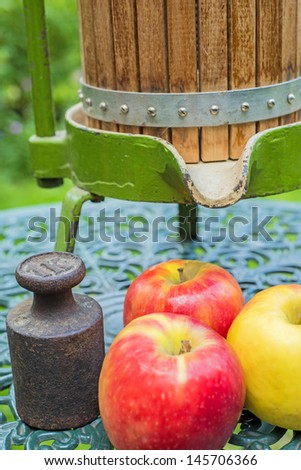 apples with old fruit press
