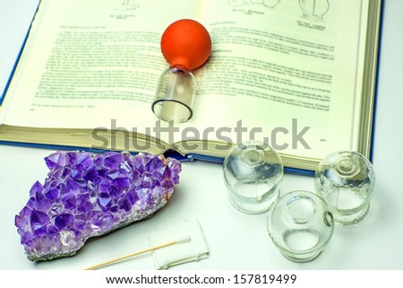Cupping glasses with textbook