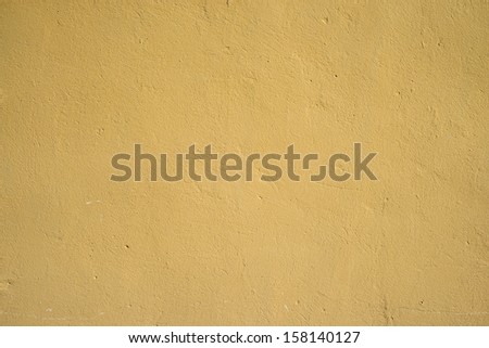 Brown wall of concrete with fines pores