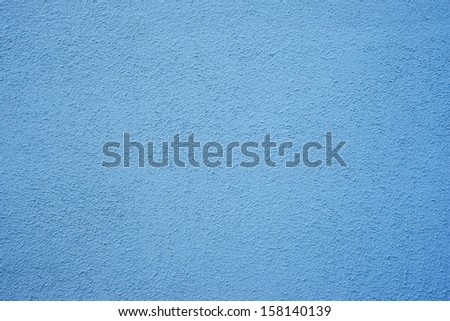 Blue wall of concrete with fines pores