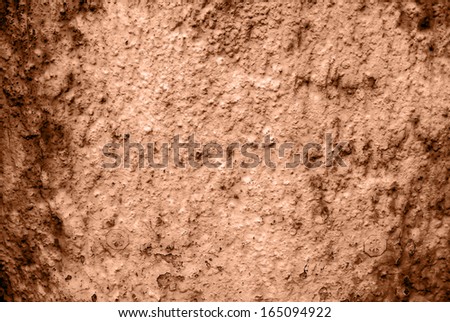 Wall of concrete with spoiled coating