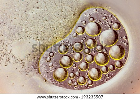 oil-drops floating  in water