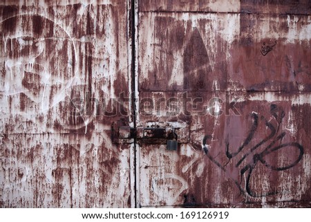Rusty purple metal door