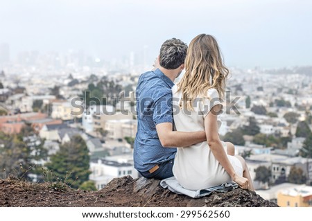 Couple looking at the city skyline
