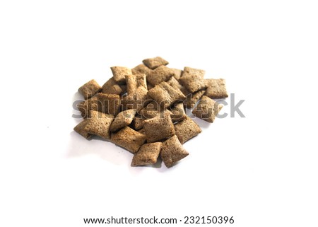 Breakfast chocolate pillows  cereals isolated on white