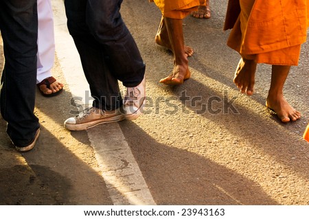 A line on the street separating ordinary people from monks
