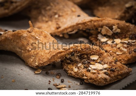 Freshly baked cookie snacks with healthy oats and chia seeds in twirl format.