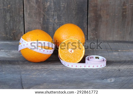 Orange,Fruit concept diet on a wooden floor.