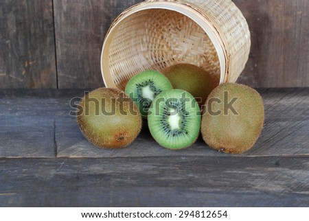 Kiwi fruit on a wooden floor