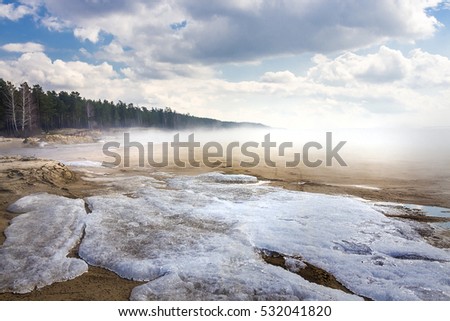Spring landscape with fog on the river. Russia, Siberia, Novosibirsk region, Ob river