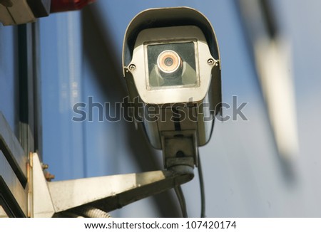 Security camera on the side of an modern building