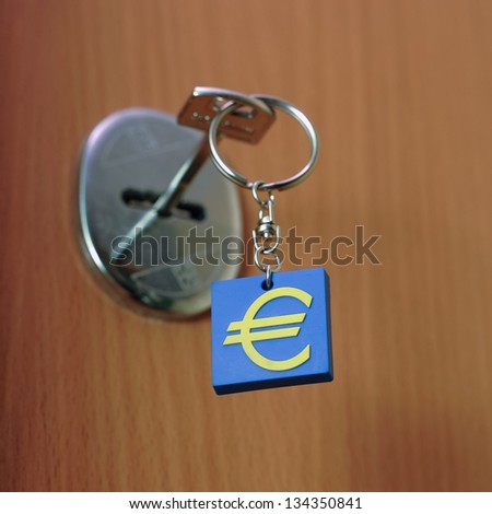 A key with a pendant with Europe union sign