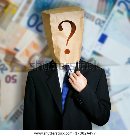 Businessman with a paper bag on head and Euro notes background