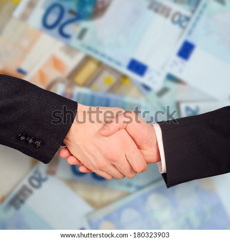 Two businessman hand grip on Euro notes background