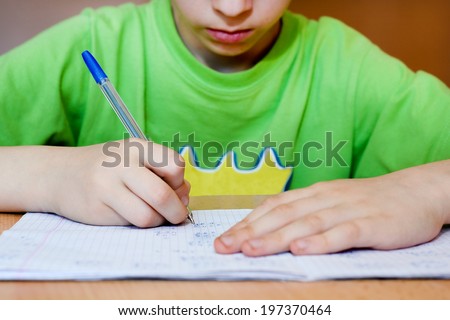 Kid making home work for school