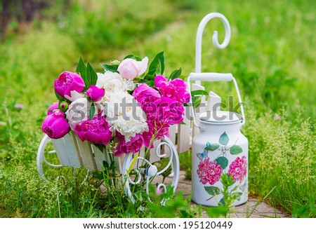 Garden still life with delicate peonies