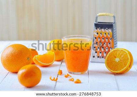 Still life with orange freshly squeezed juice