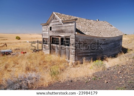 Deserted Old Barn on an empty field