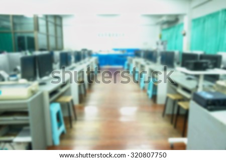 Defocused Classroom computers for background.