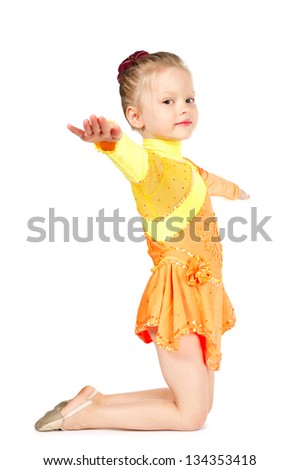 Little gymnast girl isolated on white background