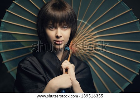 beautiful girl with aged japan umbrella