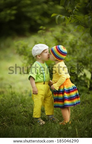 Boy with a girl in bright colored clothing love