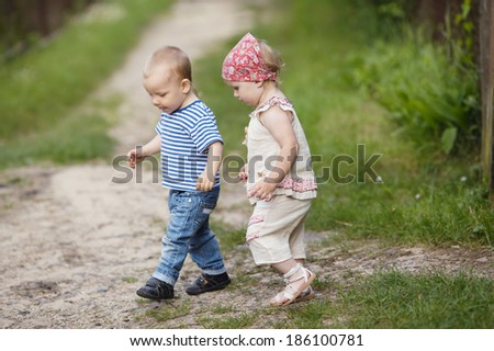 boy and girl walk together