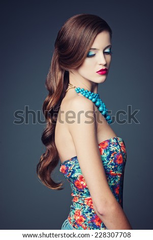 beautiful girl beauty studio portrait on dark blue background