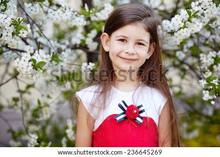 girl near the apple tree flowers