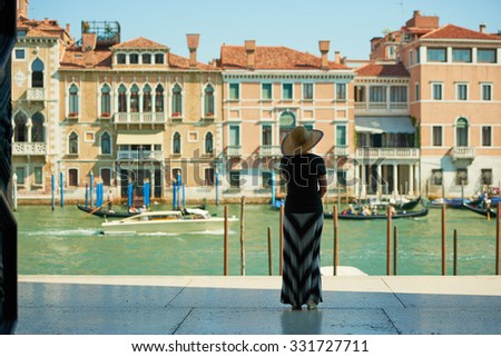 photo of woman from the back in Venice