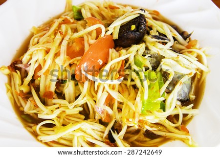 green papaya salad is a delicious traditional food and also has health benefits. , Also helps in the excretion well.