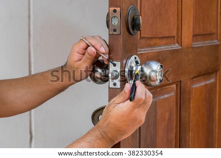 wood door and locksmith maintain silver knob