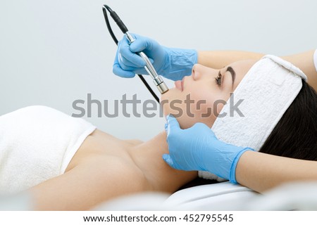 Procedure of Microdermabrasion. Mechanical Exfoliation, diamond polishing. Mode, profile. Cosmetological clinic. Healthcare, clinic, cosmetology