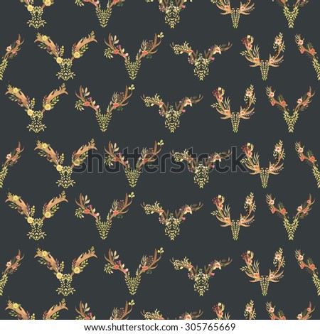 Seamless pattern with the antlers entwined by flowers, leaves and plants painted in watercolor on a dark background