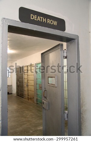 death row sign and a cell block at a prison
