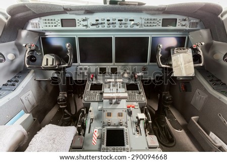 Inside view Cockpit Airplane Aircraft with blue sky and clouds