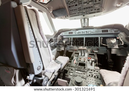 Inside view Cockpit with blue sky and clouds