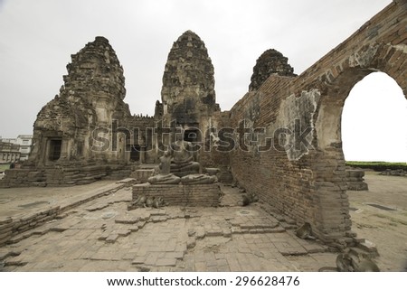 Asian religious architecture Ancient stone sculpture of Buddha at Phra Kan, Lop Buri, ruins, landscapes, many monkeys watched coverage of Thailand and attractions.