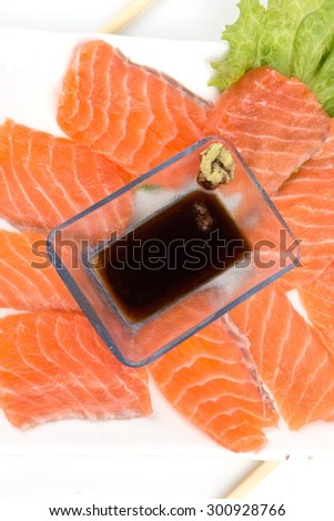 Fresh salmon, I do\
 food Sushi , Raw meat cubes photographed on a white background.
