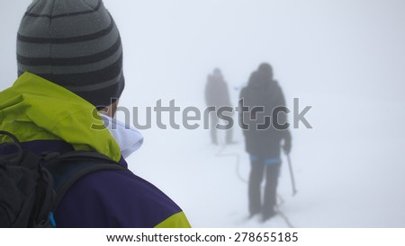 Three mountaineers lost in a Scottish mountain white-out.