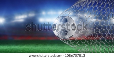 View of a 3D rendering Football ball in the net of a goal