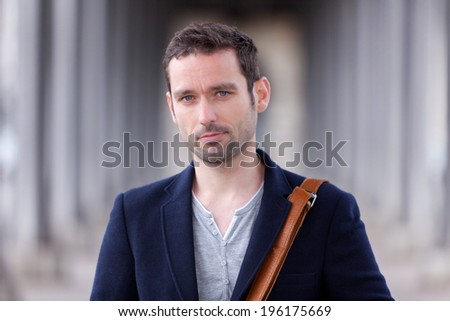 Portrait of a young attractive french man in Paris, France