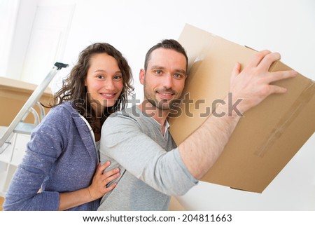 View of a Young couple in love moved in their new flat