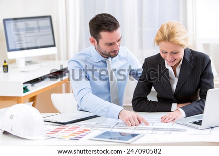 View of an Engineer and architect working at the office