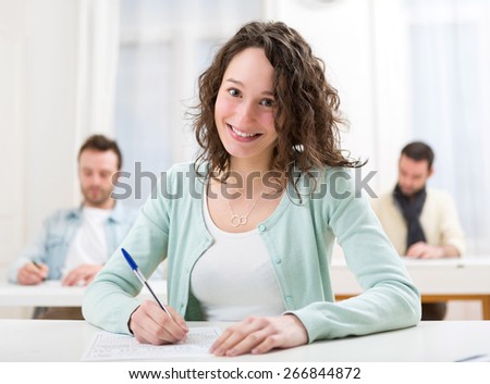 View of a Young attractive student during lessons at school