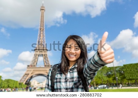 View of Young attractive asian tourist enjoying her Paris trip