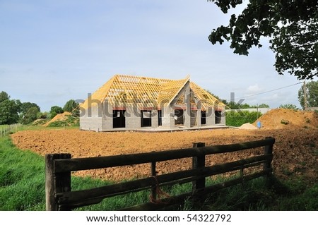A new house under construction in countryside